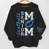 Custom Football Mom Unisex Sweatshirt, Hoodie With Design On Sleeve Personalized Birthday Football Gifts For Mom, Football Lovers, NFL Fans, Sport Lovers - Triumphant Senior Football Mama with Kid Name
