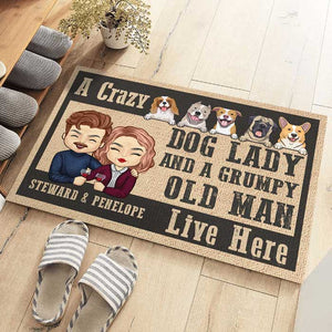 A Crazy Dog Lady And Her Grumpy Old Man Live Here - Personalized Decorative Mat.