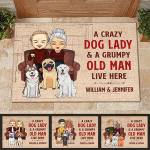 A Crazy Dog Lady And Her Grumpy Old Man Live Here - Personalized Decorative Mat.