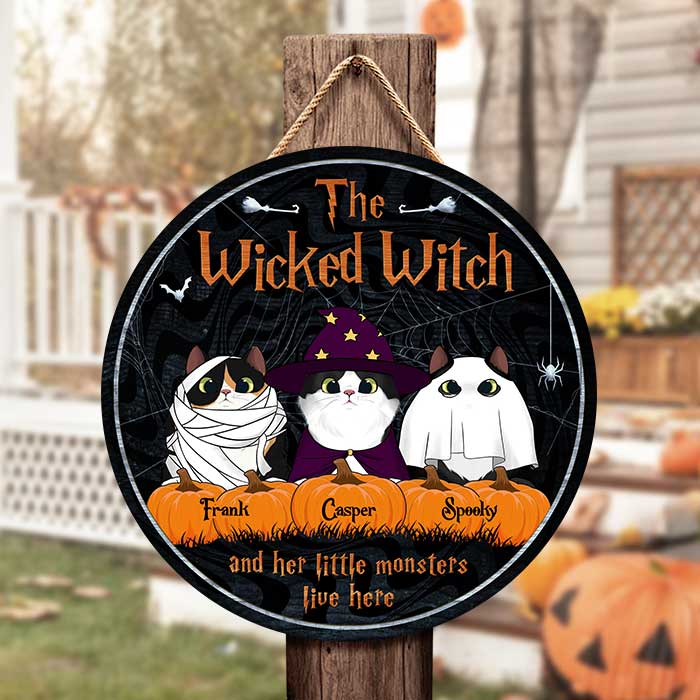 The Wicked Witch And Her Little Monsters Live Here Peeking Cats - Funny Personalized Cat Door Sign