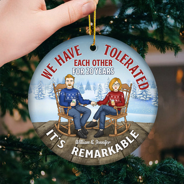 It's Remarkable That We've Tolerated For Decades - Personalized Custom Round Shaped Ceramic Christmas Ornament - Gift For Couple, Husband Wife, Anniversary, Engagement, Wedding, Marriage Gift, Christmas Gift