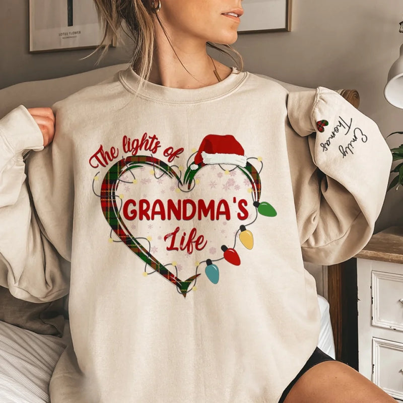 The Lights Of Grandma's Life - Family Personalized Custom Unisex Sweatshirt With Design On Sleeve - Christmas Gift For Mom, Grandma