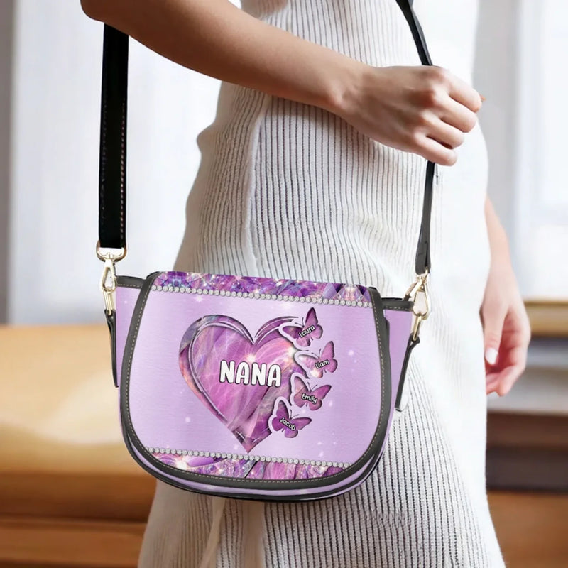 Grandma’s Love Makes Every Moment Magical - Family Personalized Custom Leather Saddle Bag - Mother's Day, Gift For Mom, Grandma