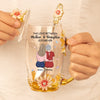 The Love Between Mother And Daughter Is Forever - Family Personalized Custom Enamel Flower Tea Cup With Lid & Spoon - Mother's Day, Gift For Mom