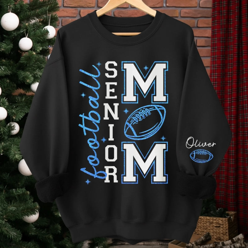 Custom Football Mom Unisex Sweatshirt, Hoodie With Design On Sleeve Personalized Birthday Football Gifts For Mom, Football Lovers, NFL Fans, Sport Lovers - Triumphant Senior Football Mama with Kid Name