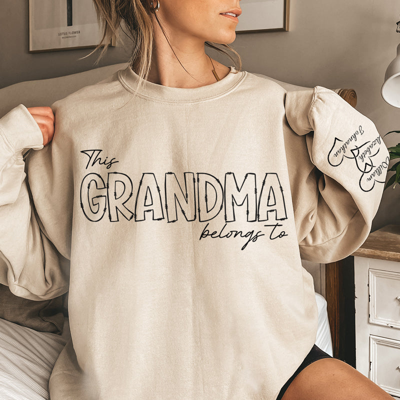 This Grandma Belongs To - Family Personalized Custom Unisex Sweatshirt With Design On Sleeve - Christmas Gift For Grandma