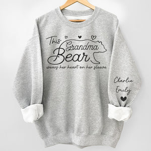 This Mama Bear Wears Her Heart On Her Sleeve - Family Personalized Custom Unisex Sweatshirt With Design On Sleeve - Gift For Mom