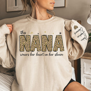 This Nana Wears Her Heart On Her Sleeve - Family Personalized Custom Unisex Sweatshirt With Design On Sleeve - Birthday Gift For Mom, Grandma