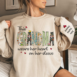 Wears Her Heart On Her Sleeve - Family Personalized Custom Unisex Sweatshirt With Design On Sleeve - Christmas Gift For Mom, Grandma