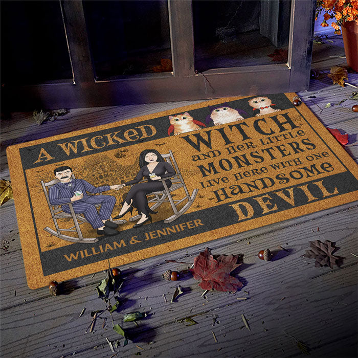 A Wicked Witch And Her Little Monsters Live Here With One Handsome Devil - Personalized Decorative Mat - Gift For Couple, Husband Wife, Gift For Pet Lovers, Halloween Gift