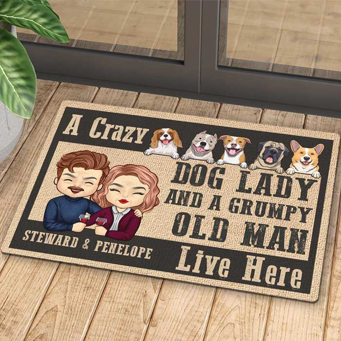 A Crazy Dog Lady And Her Grumpy Old Man Live Here -  Personalized Decorative Mat.