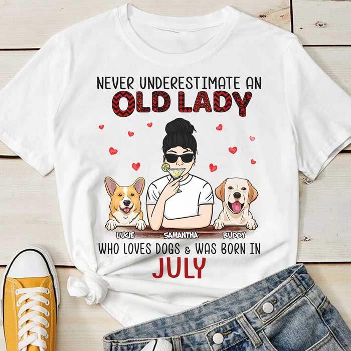 Never Underestimate An Old Lady Who Loves Dogs - Personalized Unisex T-Shirt.