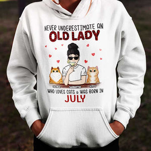 Never Underestimate An Old Lady Who Loves Cats - Personalized Unisex T-Shirt.
