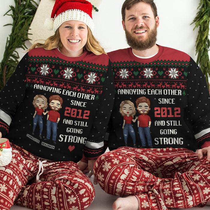 Husband wife shop christmas jumpers