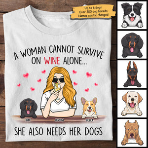 A Woman Cannot Survive On Wine Alone, She Also Needs Her Dogs - Personalized Unisex T-Shirt.
