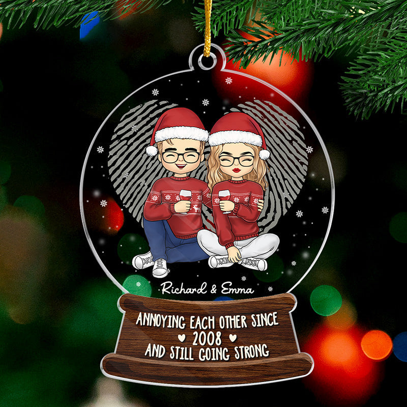 Annoying Each Other And Still Going Strong - Couple Personalized Custom Ornament - Acrylic Snow Globe Shaped - Christmas Gift For Husband Wife, Anniversary